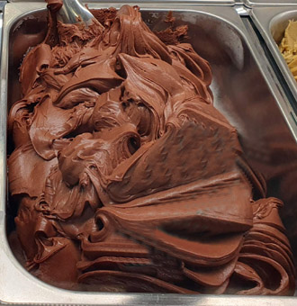 Eisidee. Neutrales Eis aus Pflanzenbasis. Cioccolate Fondente. Cremeis ohne Milchbestandteile